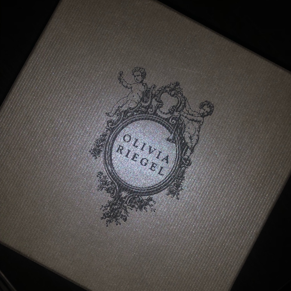 olivia riegel ring holder in the box
